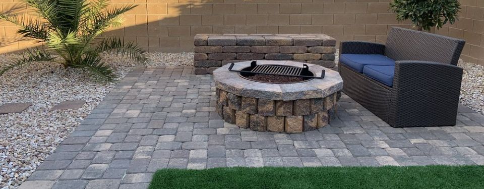 A well-landscaped seating area with pavers.